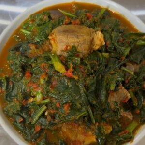 Bowl of spinach soup with assorted beef